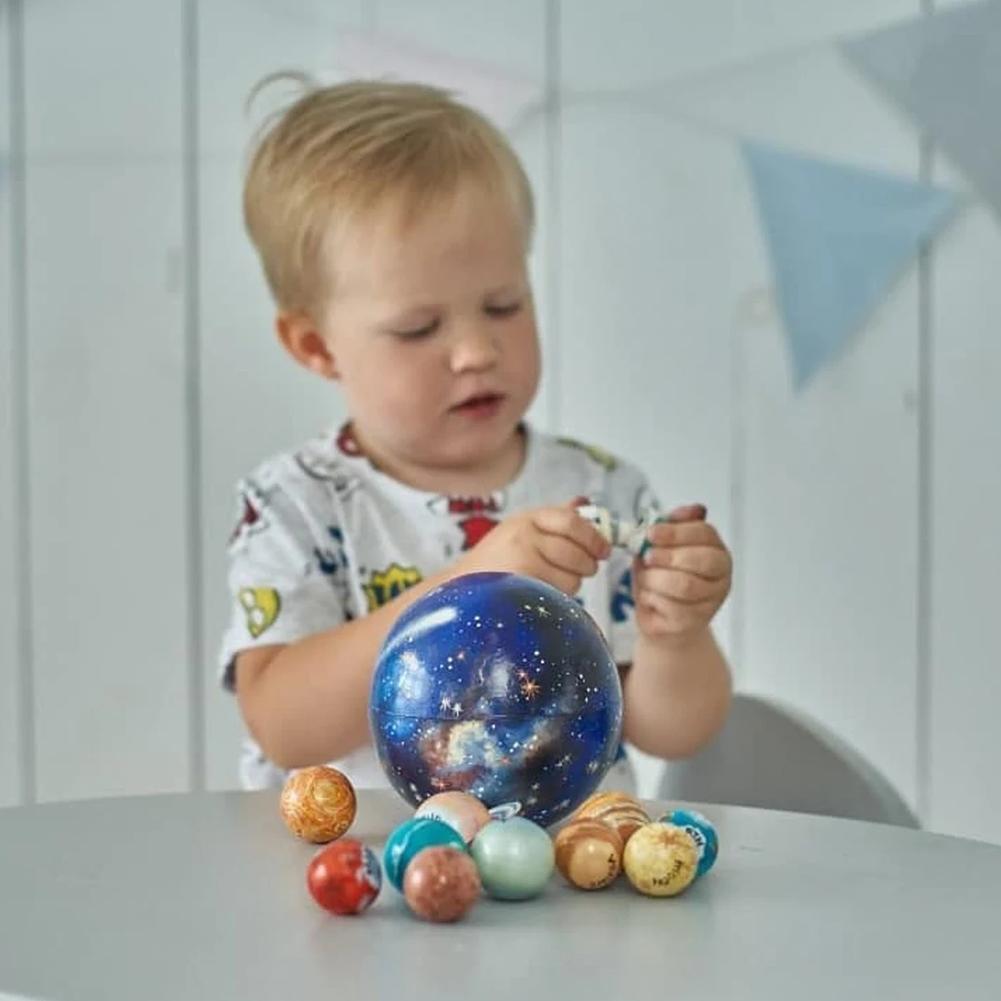 Vibrant wooden solar system toy with planets; inspires imaginative space exploration and learning for children.