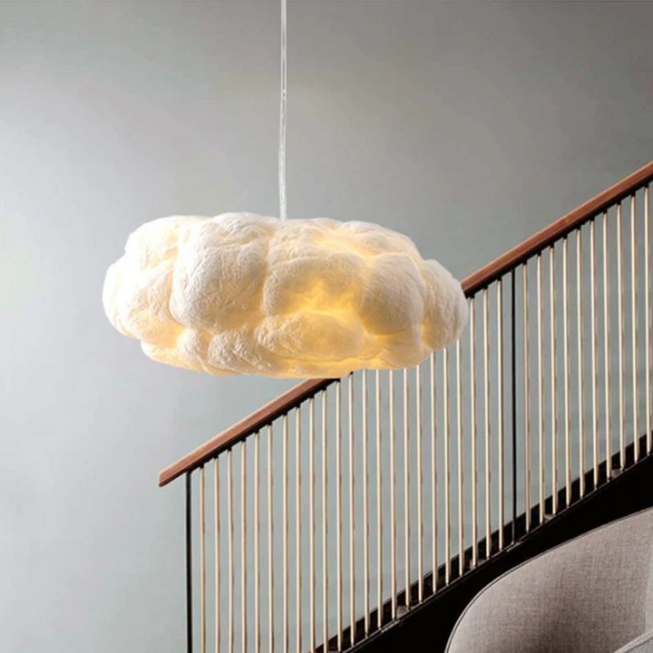 Modern white cloud LED pendant light, perfect for living room or bedroom ambient lighting.