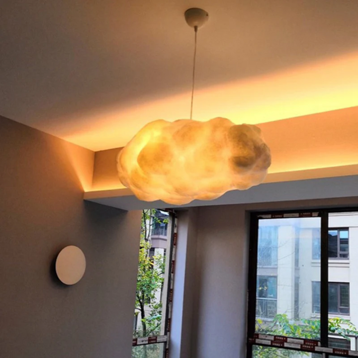 Soft diffused light from a white cloud LED pendant, ideal for modern dining room decor.