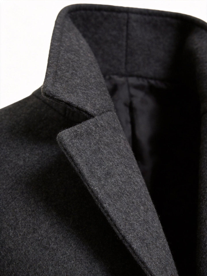 Refined men's classic long trench coat, tailored for elegant business casual outerwear.