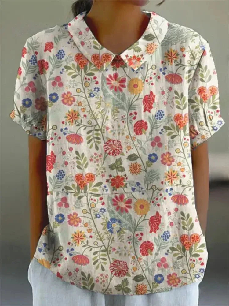 Chic women's short sleeve shirt, relaxed fit, breathable fabric, ideal for comfortable summer fashion.