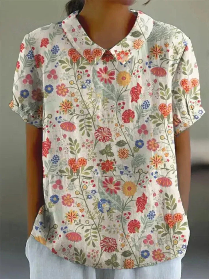 Chic women's short sleeve shirt, relaxed fit, breathable fabric, ideal for comfortable summer fashion.