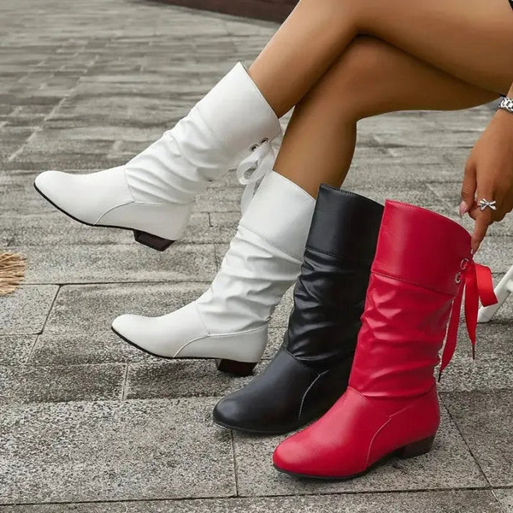 Women's slouchy lace-up ankle boots with block heel for casual everyday style.