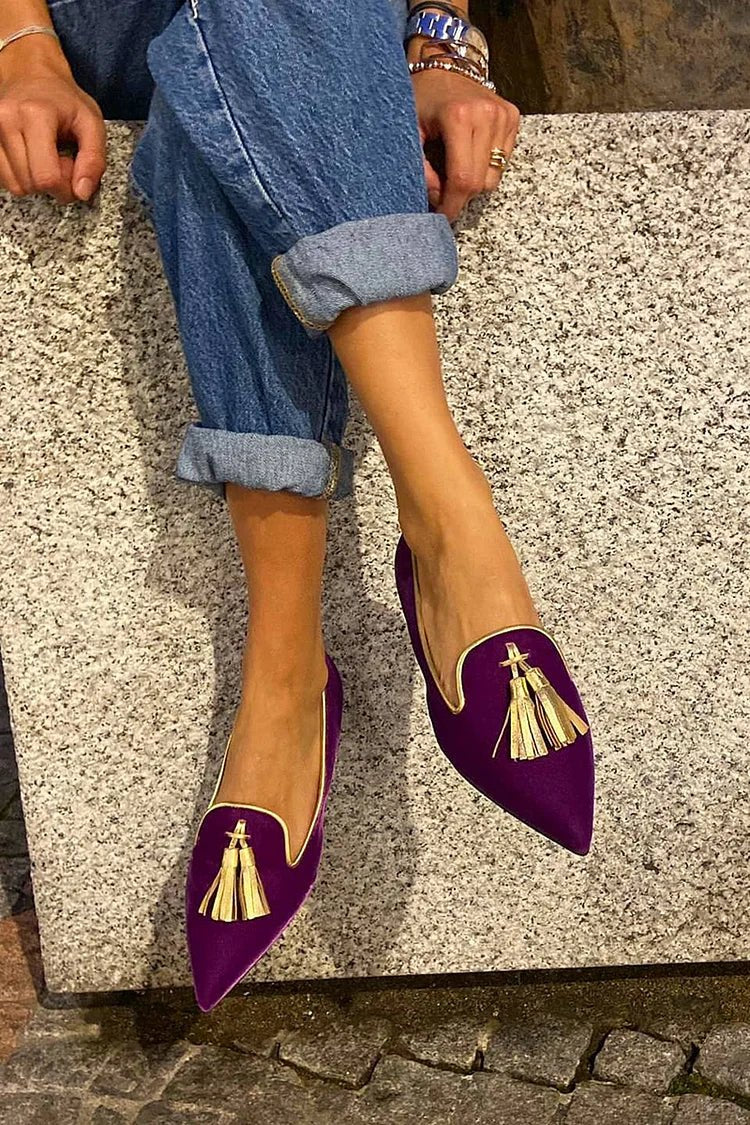 Women's chic black pointed-toe tassel loafers, perfect slip-on shoes for elegant and versatile style.