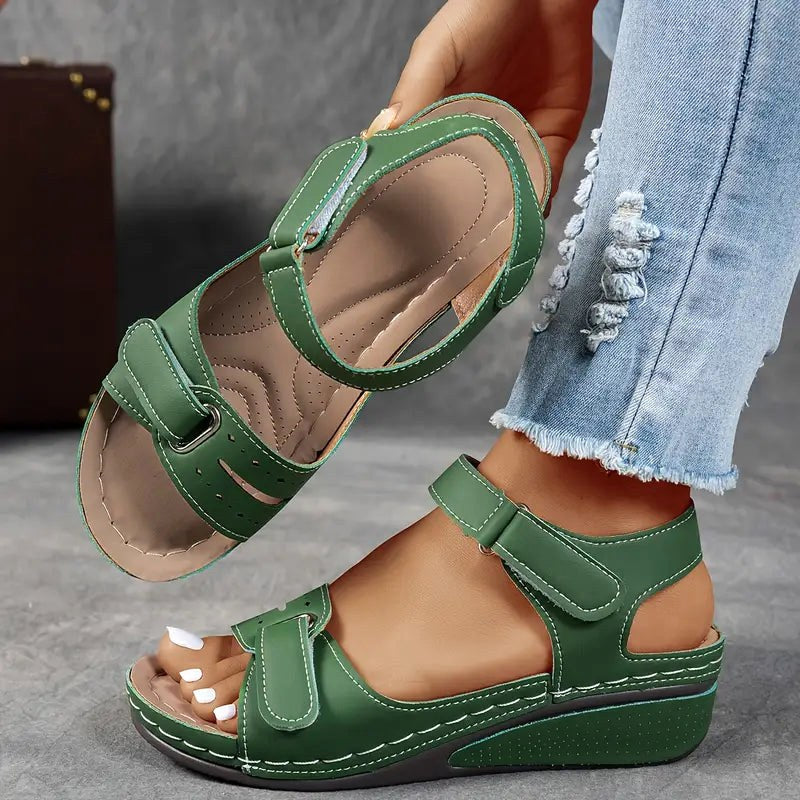 Stylish women's wedge sandals, cushioned for all-day comfort, perfect for summer casual or dressy events.