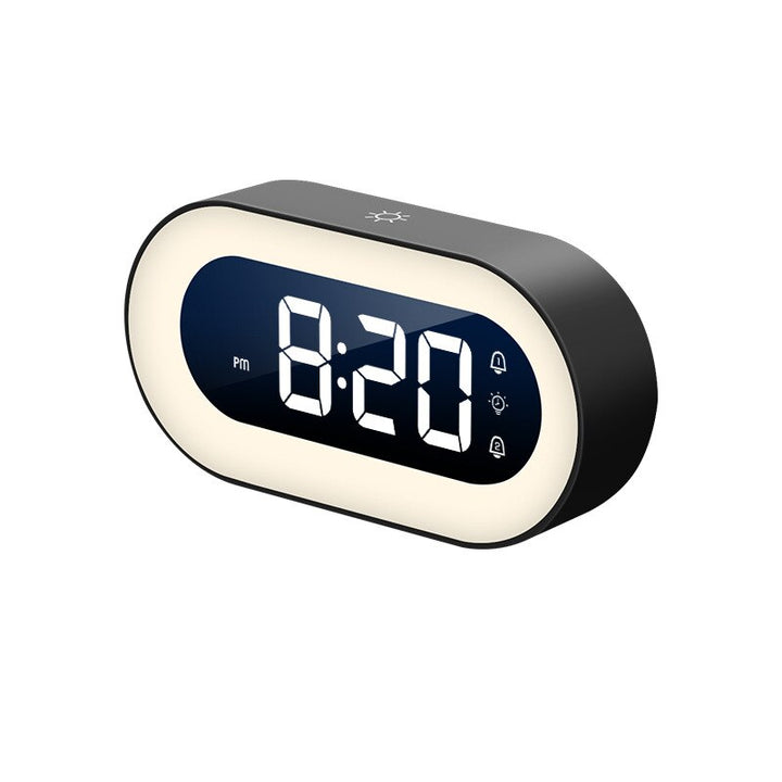 Digital alarm clock with bright LED display and gentle night light function