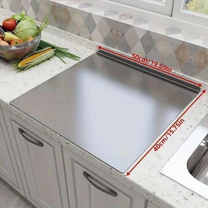 Heavy-duty stainless steel chopping board, a hygienic kitchen tool for durable food preparation.