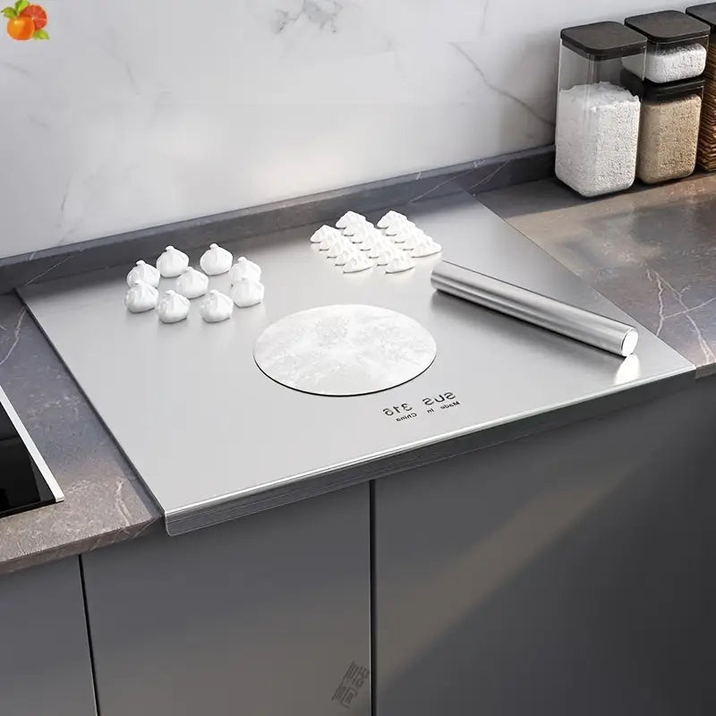Essential kitchen cookware: stainless steel chopping board, hygienic, non-slip, and dishwasher safe.