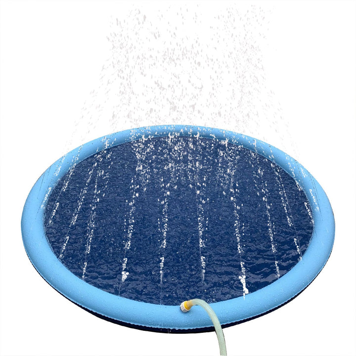 Dogs playing in a durable outdoor pet splash pad with sprinklers. Fun summer water play.