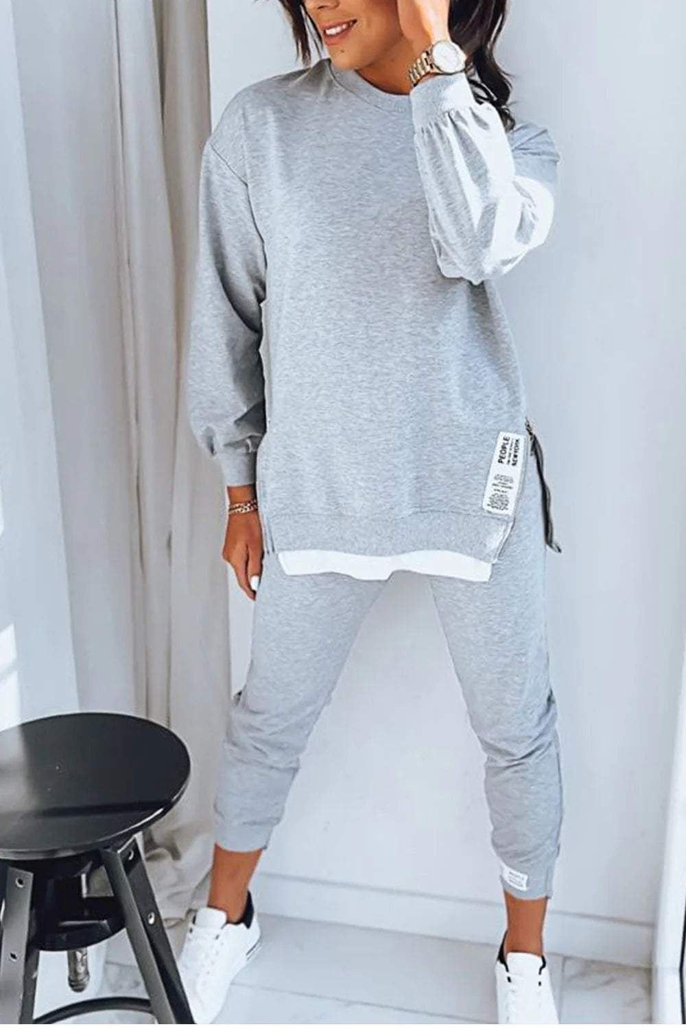 Women's cozy two-piece loungewear set in relaxed fit, perfect for ultimate comfort & casual style.