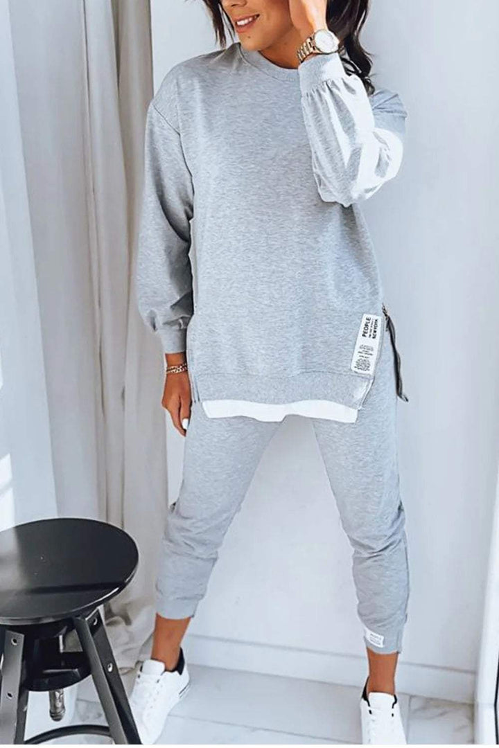 Blue women's cozy loungewear set, a two-piece relaxed fit tracksuit for ultimate comfort & style.