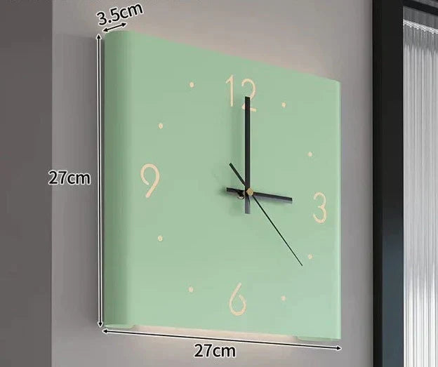 Modern double-sided illuminated wall clock. Sleek design, perfect for home decor, office, or living room accent lighting.