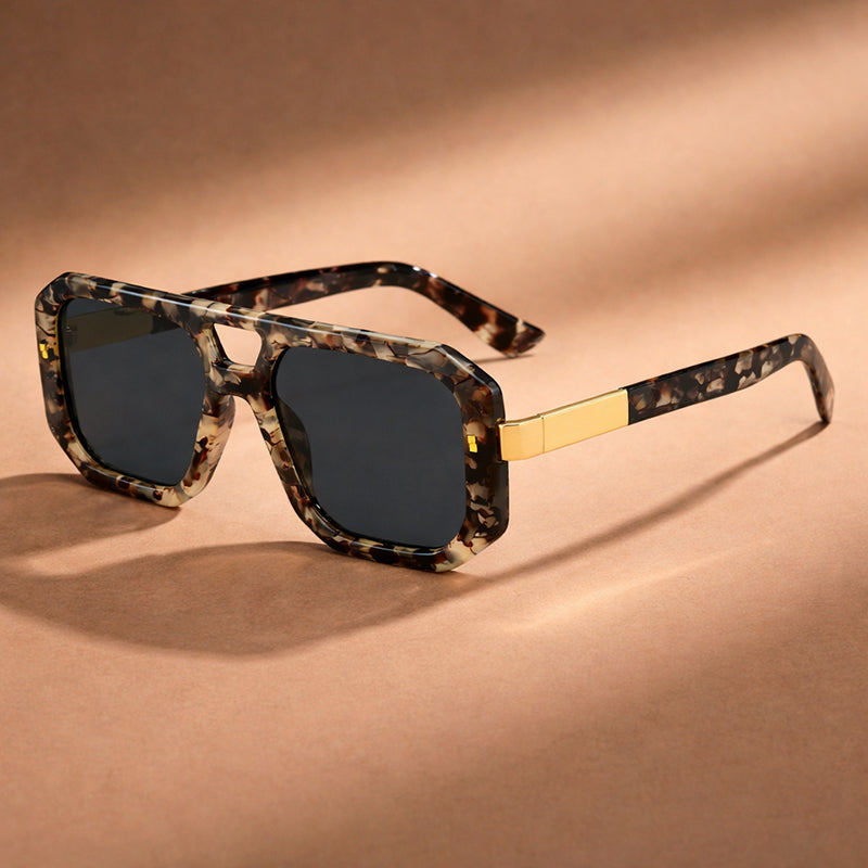 Bold geometric double bridge sunglasses. Unisex modern eyewear for a contemporary fashion statement.