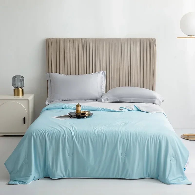 Double-sided cooling blanket for refreshing summer sleep, lightweight & breathable comfort.