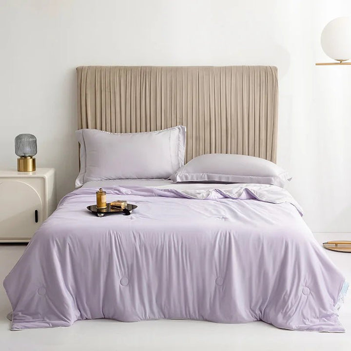 Experience refreshing sleep with this double-sided cooling blanket, soft & breathable comfort.