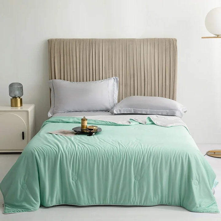 Get comfortable, refreshing sleep with this lightweight, breathable, double-sided cooling blanket.