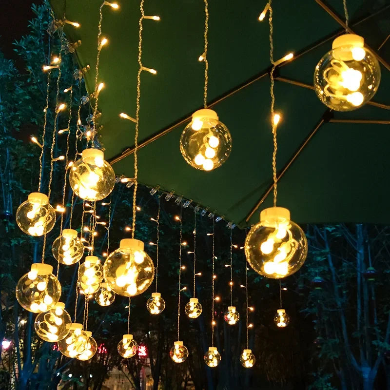 Festive outdoor LED string lights decorating a patio for a party. Waterproof, double-sided, perfect for holiday lighting.