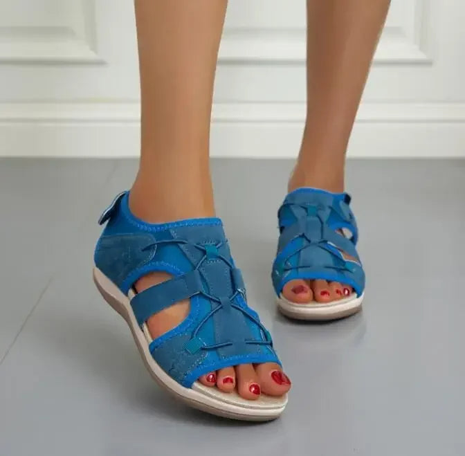 Comfortable women's orthopedic sandals with adjustable straps & arch support for all-day wear.