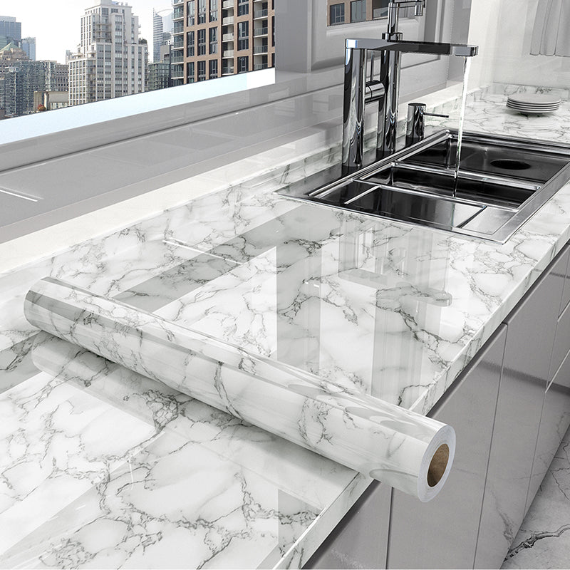 Elegant marble self-adhesive wrap for kitchen countertops & cabinets. Waterproof, oil-resistant surface protection & decor.