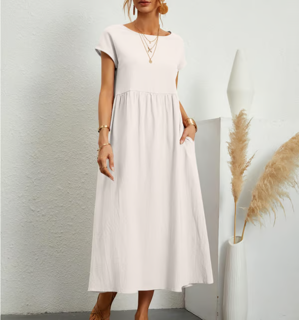 Elegant yet comfortable women's sleeveless A-line dress, a solid color summer essential with pockets.