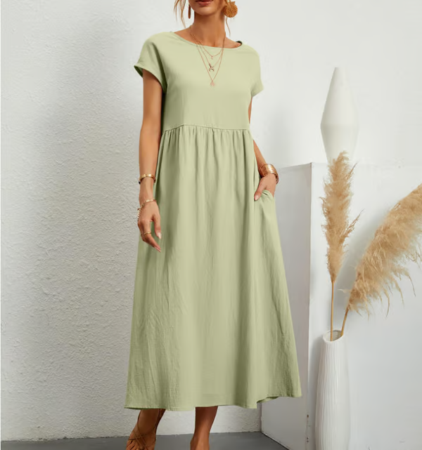 Chic women's A-line sleeveless pocket dress, offering a relaxed fit for warm summer and spring days.