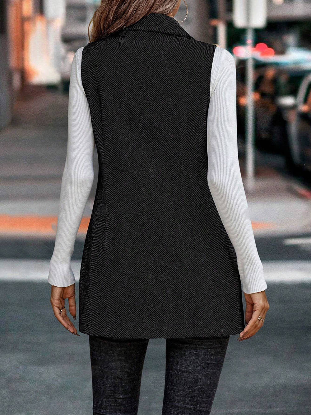 Modern women's sleeveless blazer vest with classic lapel, a stylish and chic workwear essential.