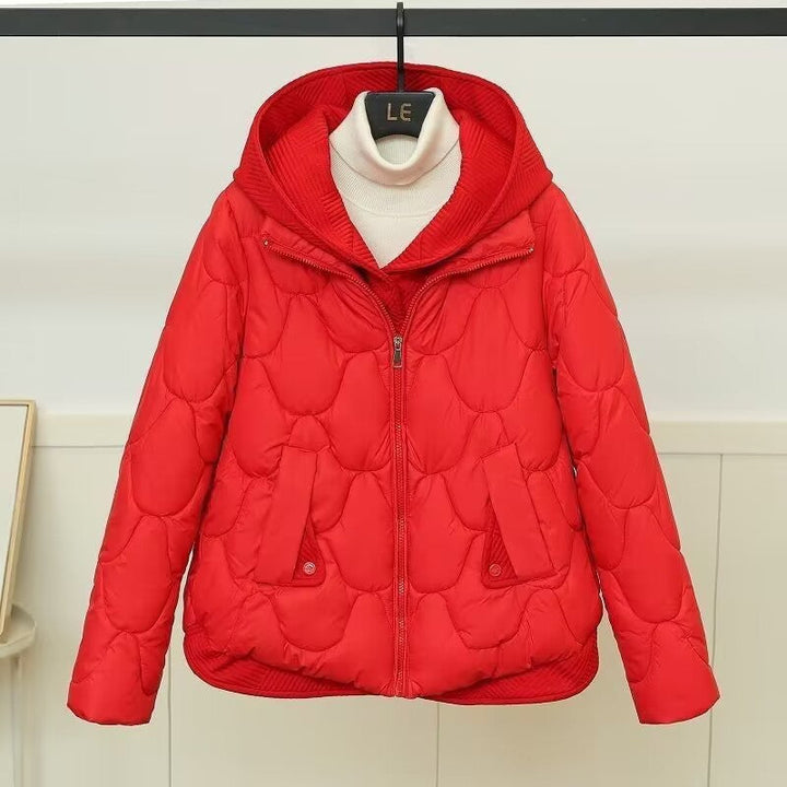 Fashion-forward Aura women's puffer jacket, blending urban style with essential warmth for winter.
