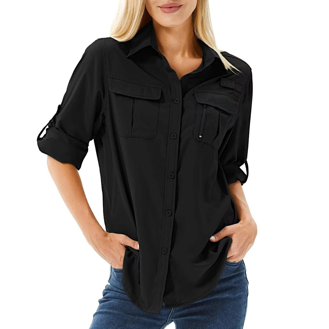Breathable women's long sleeve UPF 50 hiking shirt, comfortable activewear for sun-protected outdoor travel.