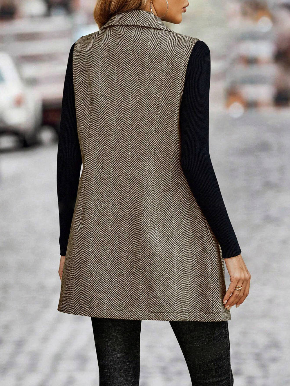 Navy women's double breasted sleeveless blazer vest, featuring a classic lapel, stylish outerwear.