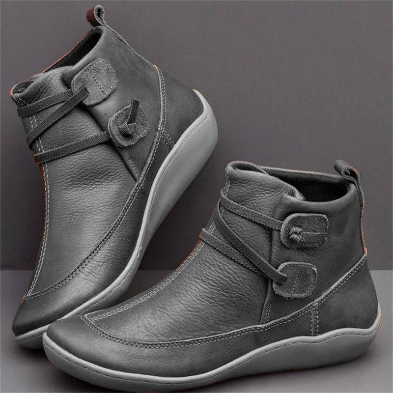 Stylish women's waterproof ankle boots, perfect for fall & winter, featuring orthopedic support & wide fit.