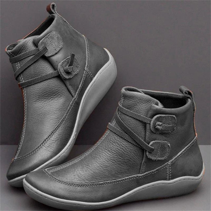 Stylish women's waterproof ankle boots, perfect for fall & winter, featuring orthopedic support & wide fit.