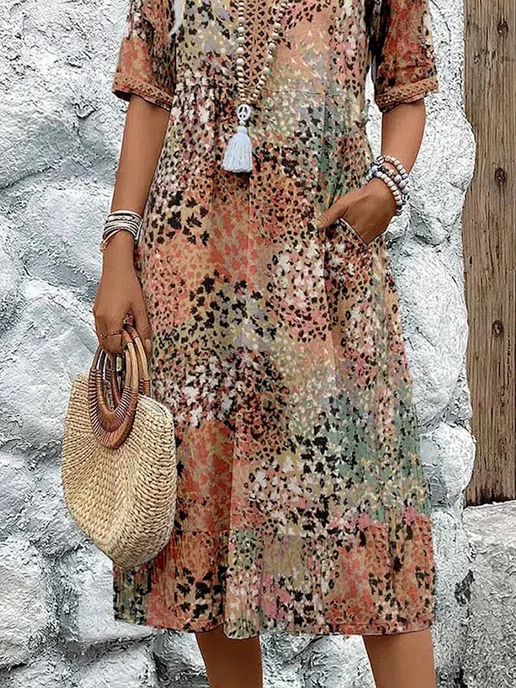Luxurious vibrant flowing midi dress for women, an elegant statement piece for summer and events.