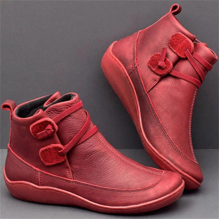 Durable women's waterproof boots with orthopedic comfort and arch support, ideal for challenging weather.