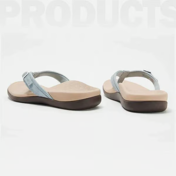 Stylish coastal slip-on sandals for women, offering arch support & comfort for summer outdoor activities.
