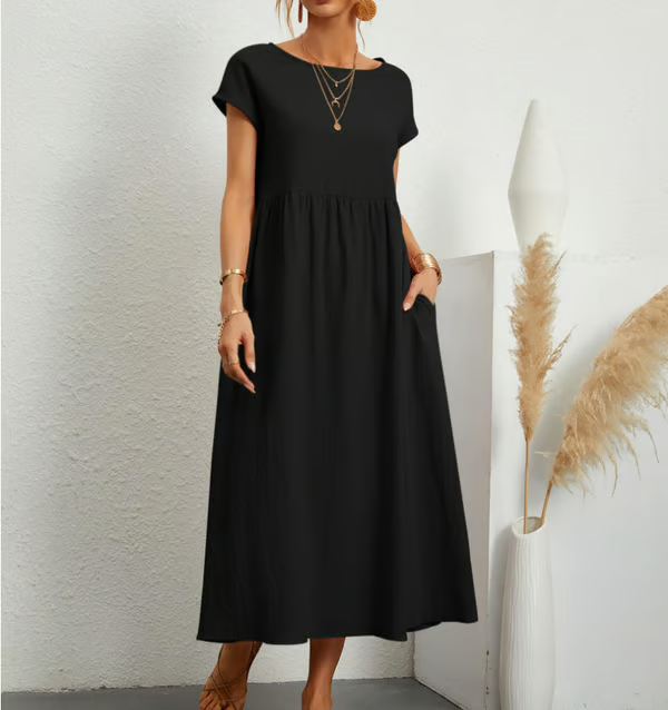 Everyday women's sleeveless A-line summer dress with a loose fit & convenient side pockets.