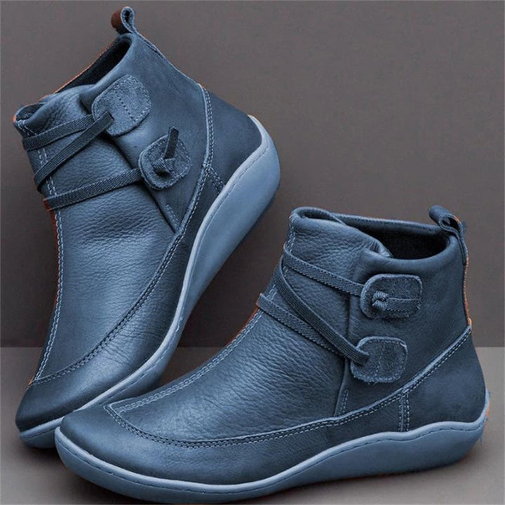 Comfortable women's orthopedic boots with arch support, designed for foot health and all-day waterproof wear.