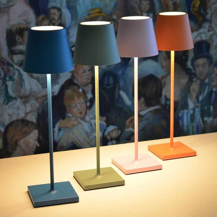 Rechargeable LED table lamp in a contemporary home setting, illuminating a reading nook.