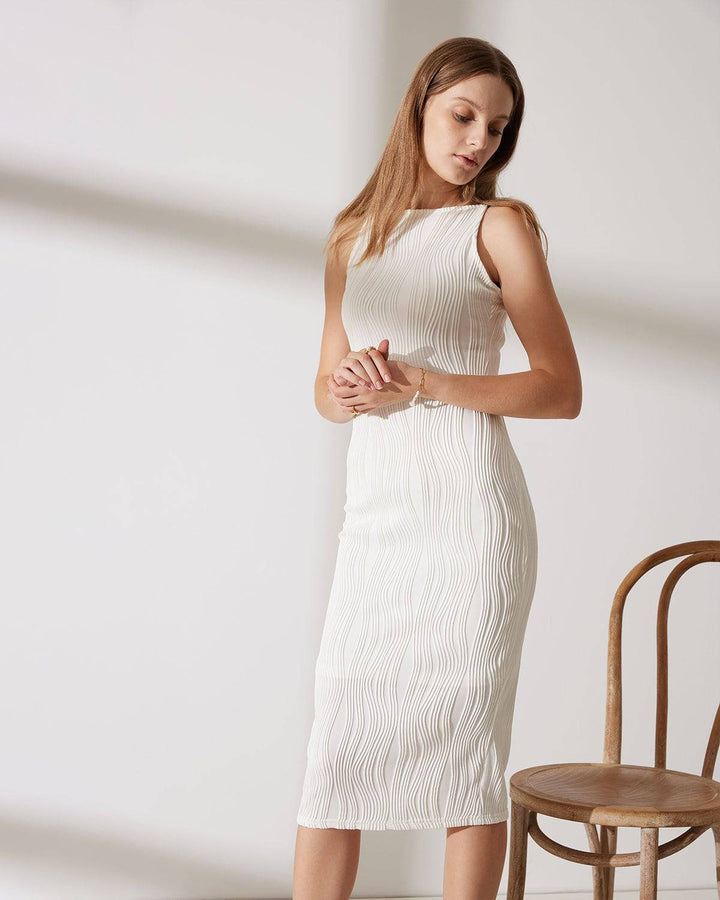 Sophisticated women's white textured cami midi dress with stunning pearl straps. A chic choice for party wear.