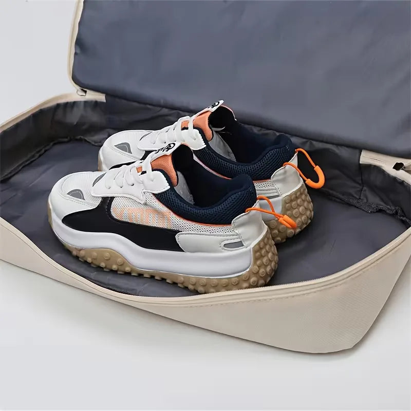 Unisex sports duffle bag with a waterproof shoe compartment, great for gym clothes & athletic gear.