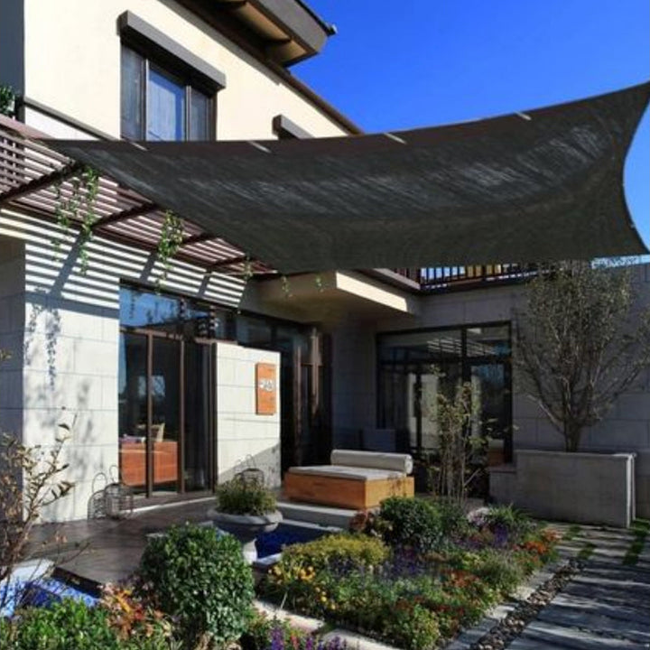Outdoor living shade net, providing heat reduction and UV block for patio comfort.