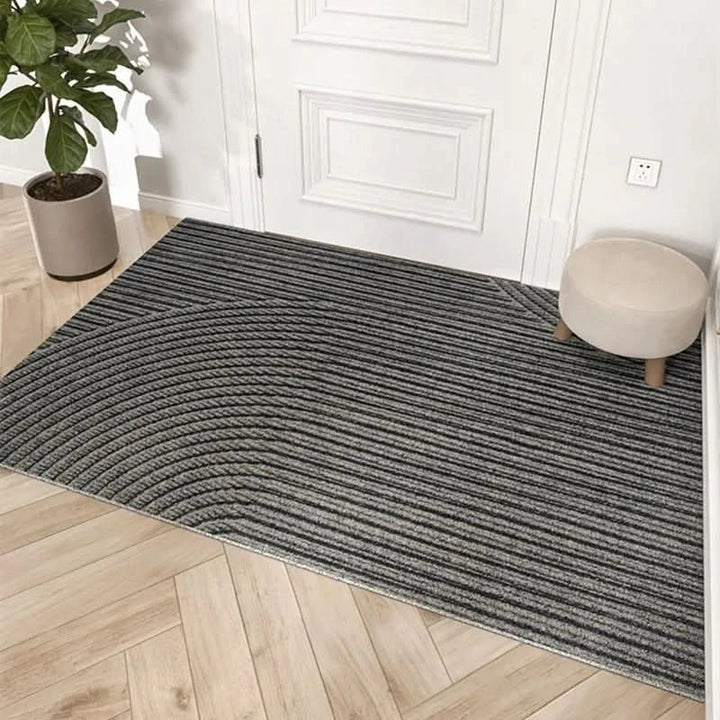 Eco-friendly polypropylene dirt trap doormat. Moisture-absorbing floor mat for a clean, non-slip home entrance.