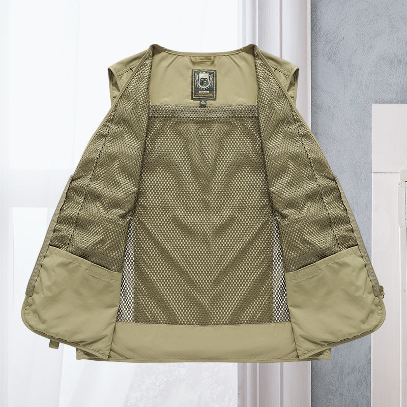Rugged men's tactical vest in military style, with many pockets. Essential durable gear for outdoor adventures.