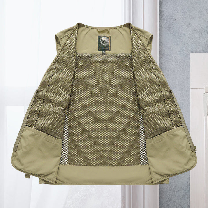 Rugged men's tactical vest in military style, with many pockets. Essential durable gear for outdoor adventures.