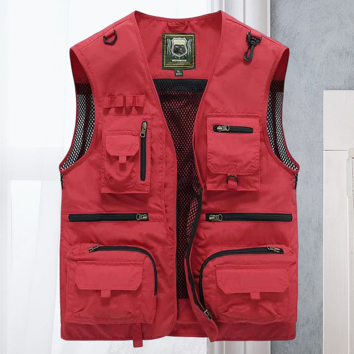 Durable men's tactical vest, ActionGuard, for outdoor adventures. Multi-pocket utility and survival gear.