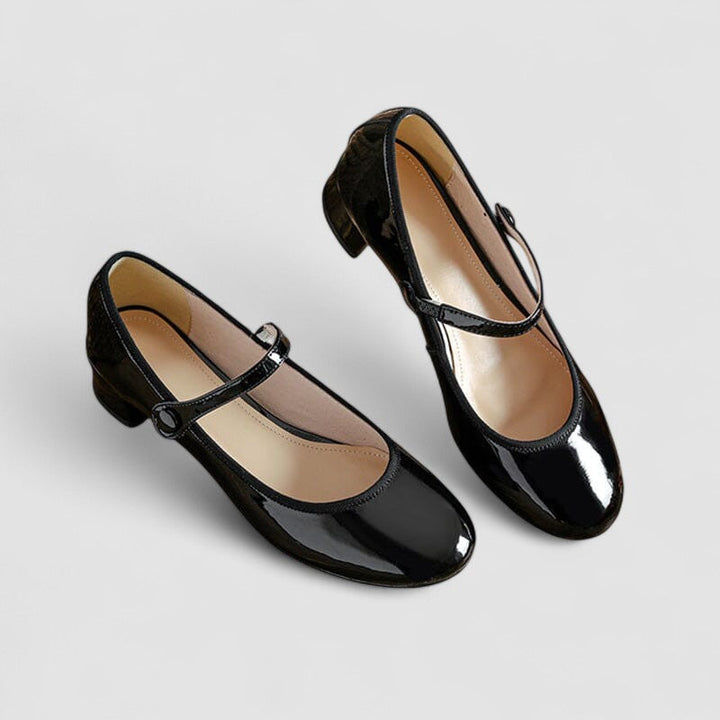 Comfortable black formal shoes for women, featuring a classic elegant design and excellent support.