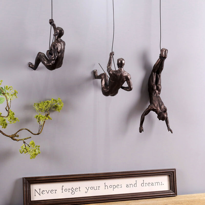 Elevate your space with this modern dynamic climber wall art sculpture. Contemporary home & office decor.