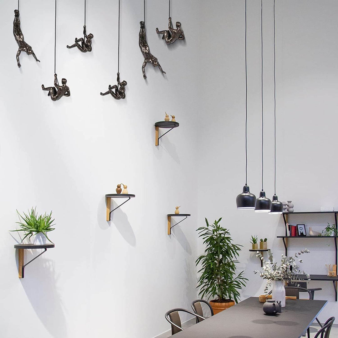Contemporary climber wall sculpture, ideal for modern home, living room, or office decor. Unique wall art.