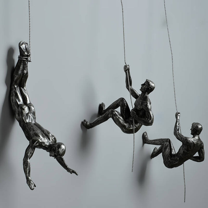 Abstract dynamic climber sculpture, a unique piece of modern wall art perfect for contemporary interior design.