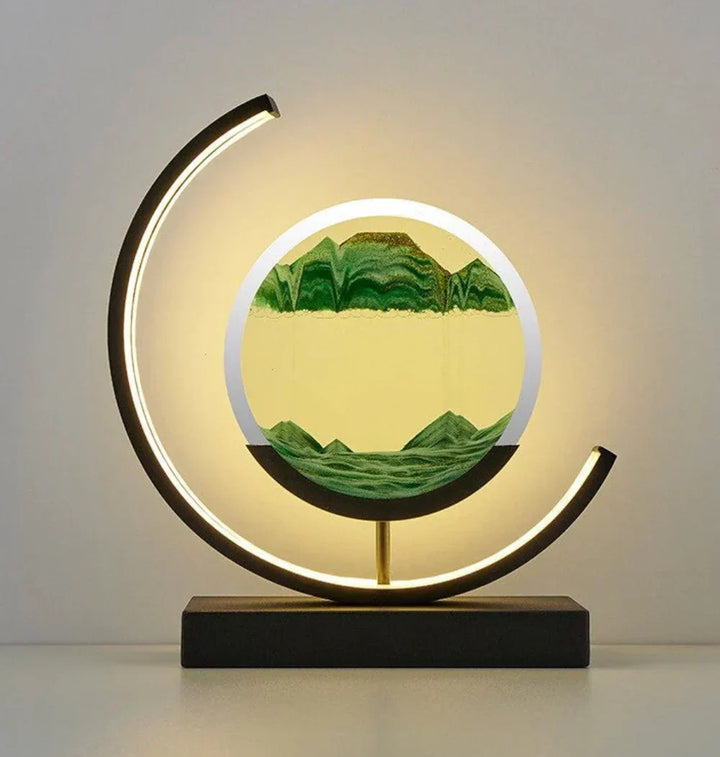 Dynamic sand art lamp creating relaxing moving landscapes for home decor. Serene mood lighting.