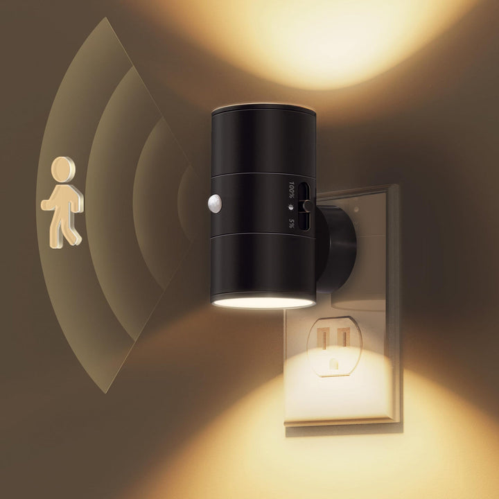 White 2-in-1 auto-sensing LED night light, perfect for indoor hallway lighting, provides a warm, convenient glow.